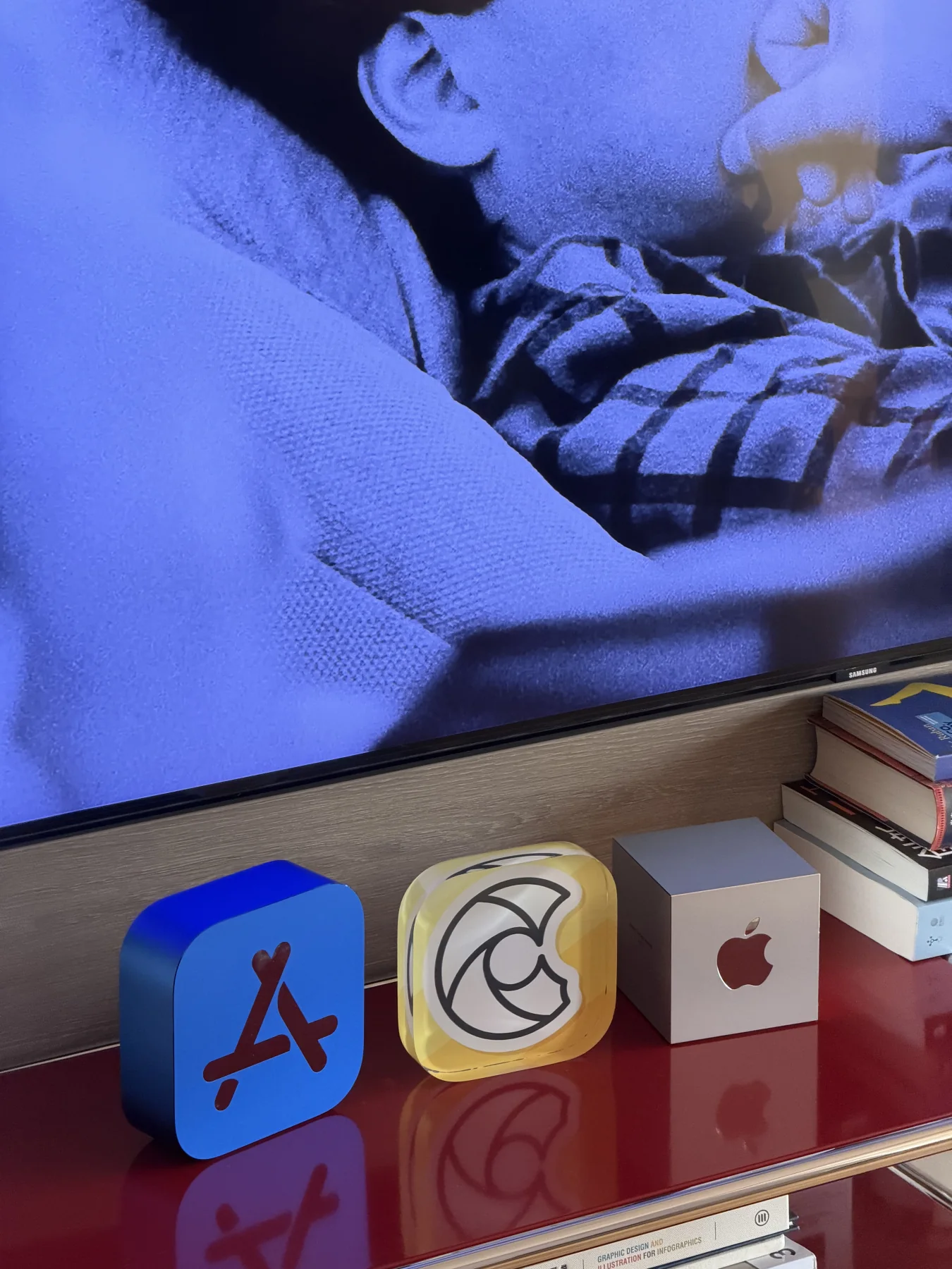 Apple and App Store award objects displayed beside CapMusic artwork